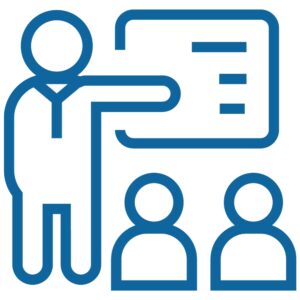 Dark blue icon of a person pointing at a whiteboard with two students.
